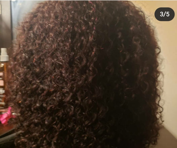 This Royal Curly Unit was custom colored to give a hint of burgundy. This unit was handmade with a 4*4 closure.